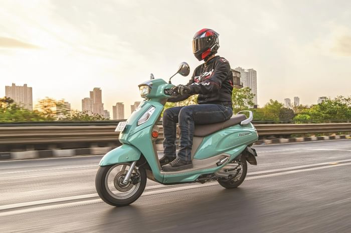 Suzuki Access front left riding shot